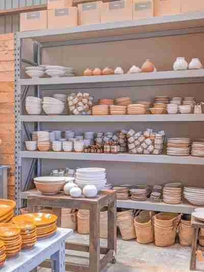 potteries on the shelf at a barn