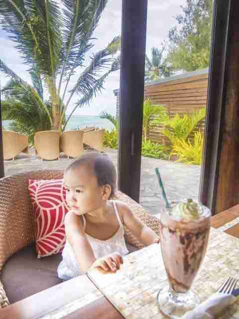 Nautilus Resort Restaurant Toddler having iced chocolate